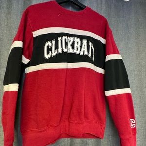 Medium red/black/white color in sweat shirt $25